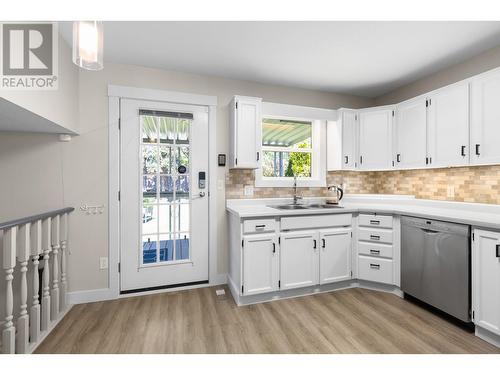 1586 Carshyl Court, Kelowna, BC - Indoor Photo Showing Kitchen With Double Sink