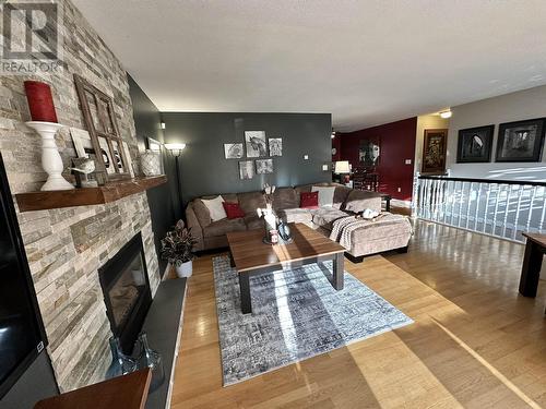 6374 Dawson Road, Prince George, BC - Indoor Photo Showing Living Room With Fireplace