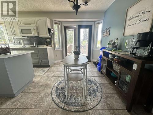 5543 Maxhamish Crescent, Fort Nelson, BC - Indoor Photo Showing Kitchen With Double Sink