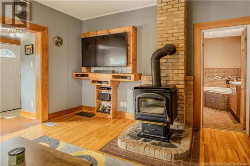 141 St. George Street, Sussex, NB - Indoor Photo Showing Living Room With Fireplace