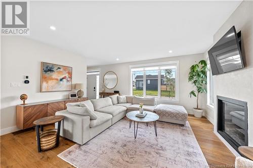 30 Jocelyne, Shediac, NB - Indoor Photo Showing Living Room With Fireplace