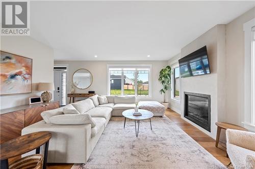 30 Jocelyne, Shediac, NB - Indoor Photo Showing Living Room With Fireplace