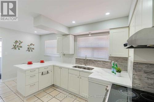 Upper - 11 Garfield Crescent, Brampton, ON - Indoor Photo Showing Kitchen With Double Sink