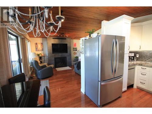 38 Lakeshore Drive Lot# 38, Vernon, BC - Indoor Photo Showing Kitchen With Fireplace