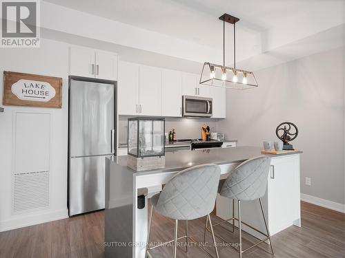 232 - 681 Yonge Street, Barrie (Painswick South), ON - Indoor Photo Showing Kitchen With Stainless Steel Kitchen With Upgraded Kitchen