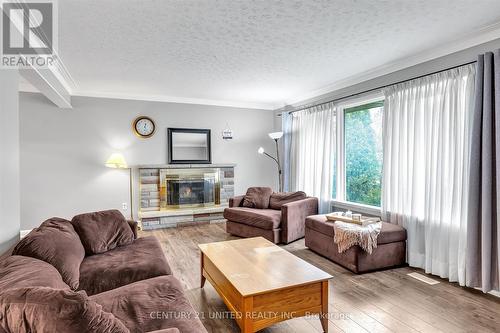 813 Norwood Terrace, Peterborough (Monaghan), ON - Indoor Photo Showing Living Room With Fireplace