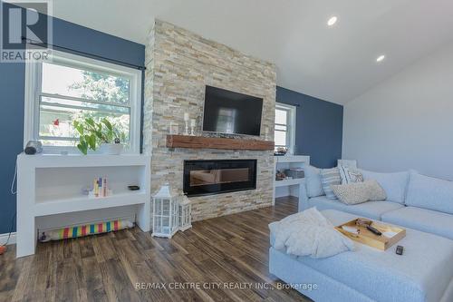 45024 Talbot Line, Central Elgin, ON - Indoor Photo Showing Living Room With Fireplace