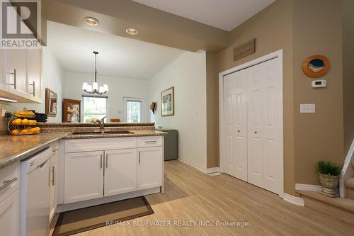 21 - 55 Lake Road W, Lambton Shores (Grand Bend), ON - Indoor Photo Showing Kitchen With Double Sink