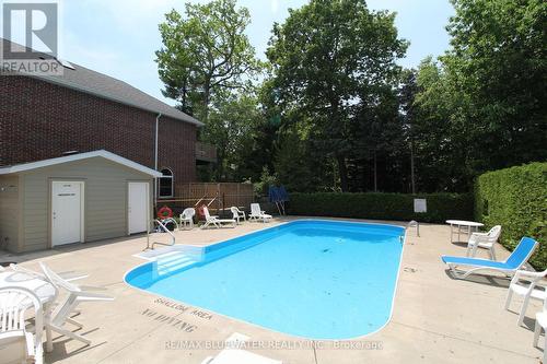 21 - 55 Lake Road W, Lambton Shores (Grand Bend), ON - Outdoor With In Ground Pool With Deck Patio Veranda