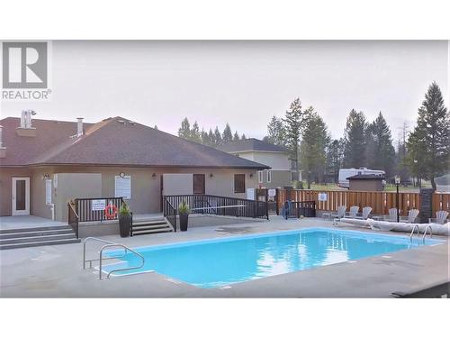 700 Bighorn  Boulevard Unit# 715 D, Radium Hot Springs, BC - Outdoor With In Ground Pool With Deck Patio Veranda