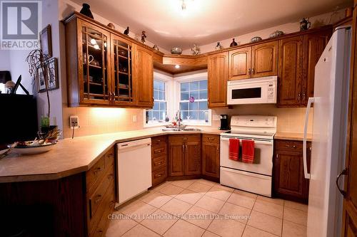 82 Livingwood Crescent, Madoc, ON - Indoor Photo Showing Kitchen With Double Sink