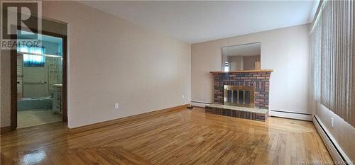 13 Stafford Street, Moncton, NB - Indoor Photo Showing Living Room With Fireplace