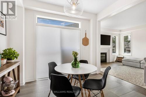 1381 Davis Loop, Innisfil, ON - Indoor Photo Showing Dining Room With Fireplace