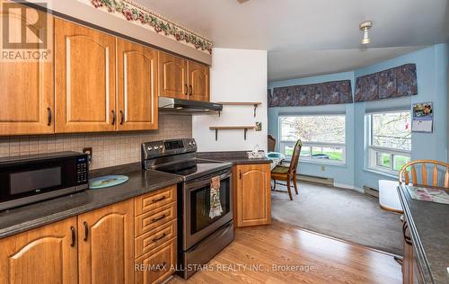 207 - 111 Grew Boulevard, Georgina (Sutton & Jackson'S Point), ON - Indoor Photo Showing Kitchen