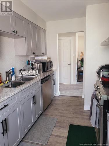 21 Johnson Avenue, Moncton, NB - Indoor Photo Showing Kitchen With Double Sink