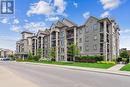 205 - 1450 Main Street E, Milton (Dempsey), ON  - Outdoor With Balcony With Facade 