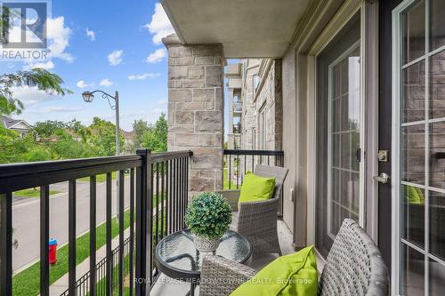 205 - 1450 Main Street E, Milton (Dempsey), ON - Outdoor With Balcony With Exterior