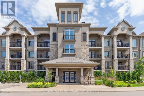 205 - 1450 Main Street E, Milton (Dempsey), ON - Outdoor With Balcony With Facade