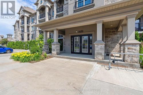 205 - 1450 Main Street E, Milton (Dempsey), ON - Outdoor With Facade