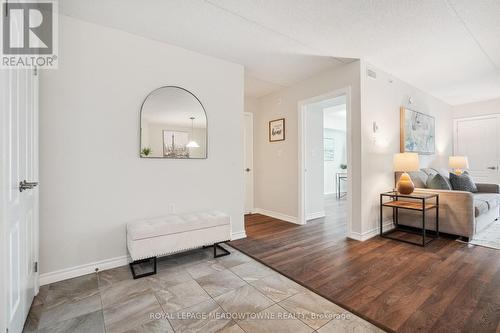 205 - 1450 Main Street E, Milton (Dempsey), ON - Indoor Photo Showing Living Room