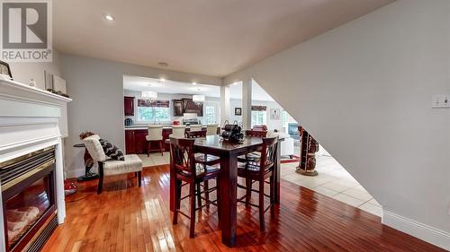 40-44 Summit Drive, Paradise, NL - Indoor Photo Showing Dining Room With Fireplace