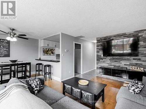 230 - 1055 Dundas Street E, Mississauga, ON - Indoor Photo Showing Living Room