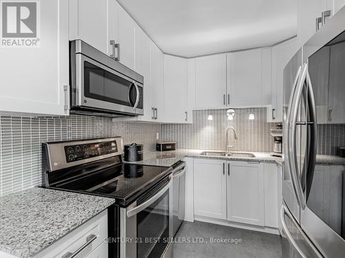 230 - 1055 Dundas Street E, Mississauga (Applewood), ON - Indoor Photo Showing Kitchen With Double Sink With Upgraded Kitchen