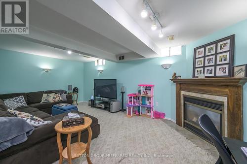 239 Portsmouth Crescent E, London, ON - Indoor Photo Showing Living Room With Fireplace