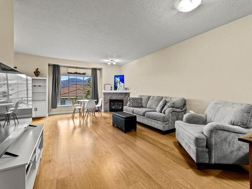 501-875 Sahali Terrace, Kamloops, BC - Indoor Photo Showing Living Room With Fireplace