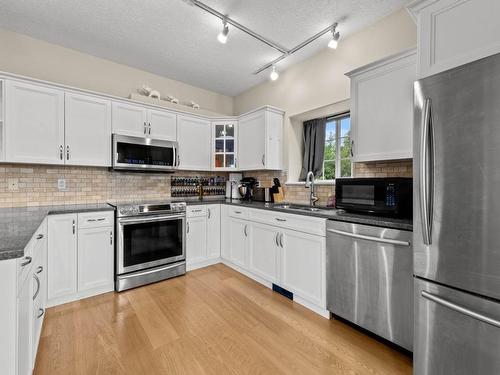 501-875 Sahali Terrace, Kamloops, BC - Indoor Photo Showing Kitchen With Double Sink