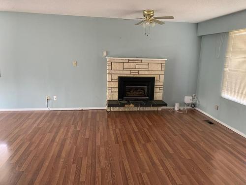 2402 Clapperton Ave, Merritt, BC - Indoor Photo Showing Living Room With Fireplace