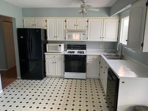 2402 Clapperton Ave, Merritt, BC - Indoor Photo Showing Kitchen With Double Sink