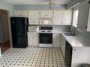 2402 Clapperton Ave, Merritt, BC  - Indoor Photo Showing Kitchen With Double Sink 