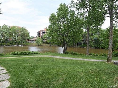 Bord de l'eau - 101-77 Prom. Des Îles, Laval (Chomedey), QC - Outdoor With View