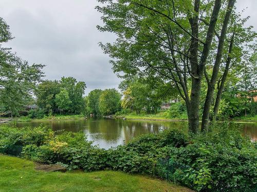 101-77 Prom. Des Îles, Laval (Chomedey), QC - Outdoor With Body Of Water