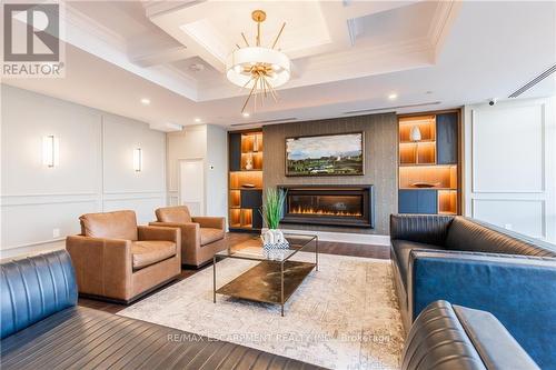 807 - 470 Dundas Street E, Hamilton (Waterdown), ON - Indoor Photo Showing Living Room With Fireplace