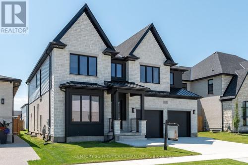 7230 Silver Creek Circle, London, ON - Outdoor With Facade