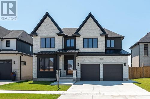 7230 Silver Creek Circle, London, ON - Outdoor With Facade