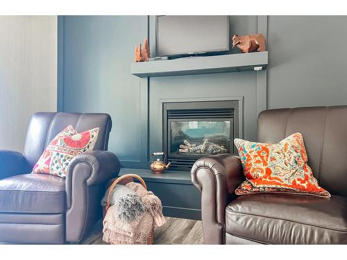 3016 1St Avenue, Castlegar, BC - Indoor Photo Showing Living Room With Fireplace