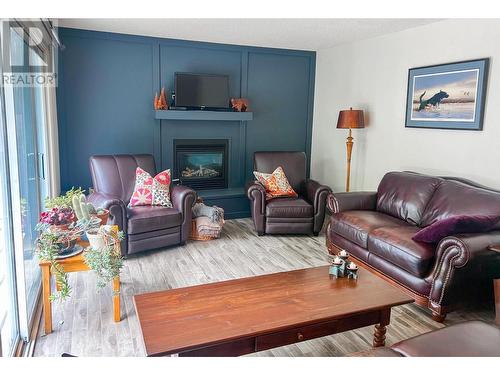 3016 1St Avenue, Castlegar, BC - Indoor Photo Showing Living Room With Fireplace