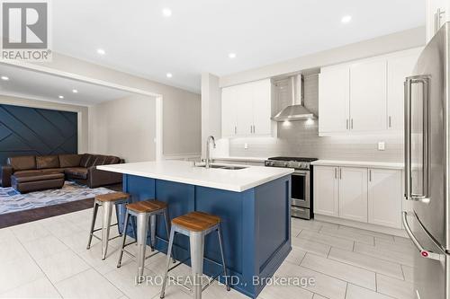 48 Pridham Place, New Tecumseth (Tottenham), ON - Indoor Photo Showing Kitchen With Stainless Steel Kitchen With Double Sink With Upgraded Kitchen