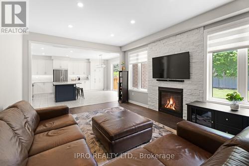 48 Pridham Place, New Tecumseth (Tottenham), ON - Indoor Photo Showing Living Room With Fireplace