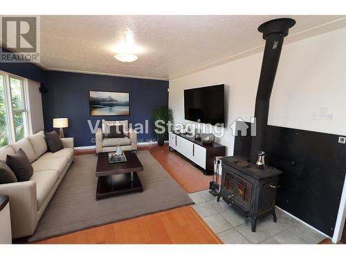 1230 Cuddie Crescent, Prince George, BC - Indoor Photo Showing Living Room With Fireplace