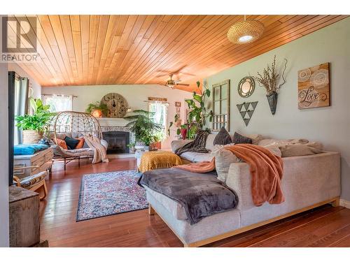 9486 Angus Drive, Coldstream, BC - Indoor Photo Showing Living Room With Fireplace