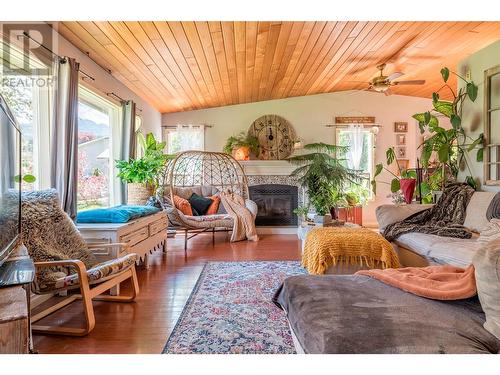 9486 Angus Drive, Coldstream, BC - Indoor Photo Showing Living Room With Fireplace