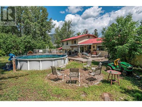 9486 Angus Drive, Coldstream, BC - Outdoor With Above Ground Pool With Deck Patio Veranda With Backyard