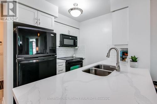 624 - 25 Greenview Avenue, Toronto (Newtonbrook West), ON - Indoor Photo Showing Kitchen With Double Sink