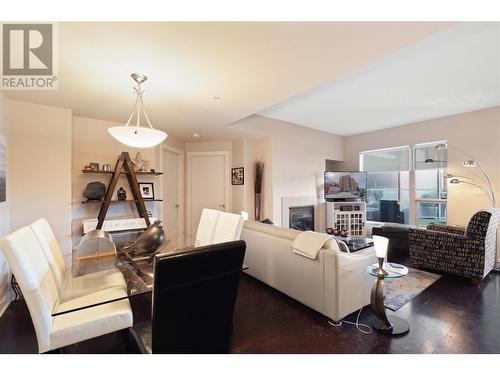 1160 Bernard Avenue Unit# 212, Kelowna, BC - Indoor Photo Showing Living Room With Fireplace