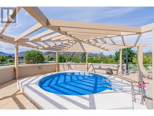 1160 Bernard Avenue Unit# 212, Kelowna, BC - Outdoor With In Ground Pool With Deck Patio Veranda