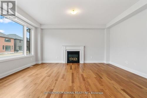 32 Mckay Avenue, Kawartha Lakes, ON - Indoor Photo Showing Living Room With Fireplace